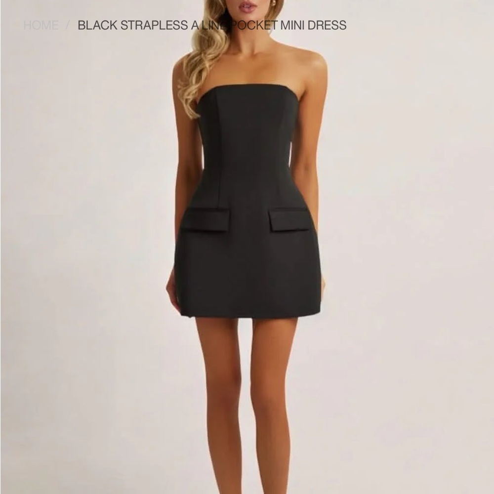 BLACK STRAPLESS A LINE POCKET MINI DRESS
